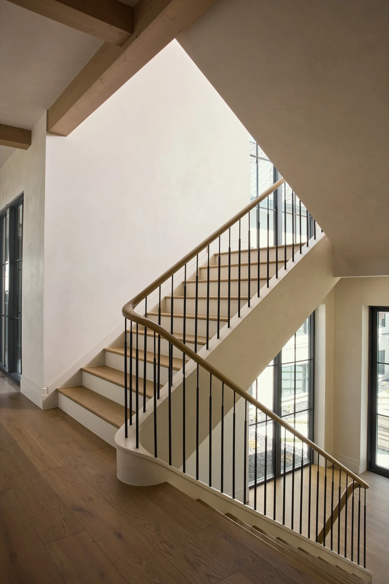 Detailed stair and millwork finish by Tauro Painting